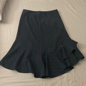 Pinstriped skirt with ruffles at the bottom